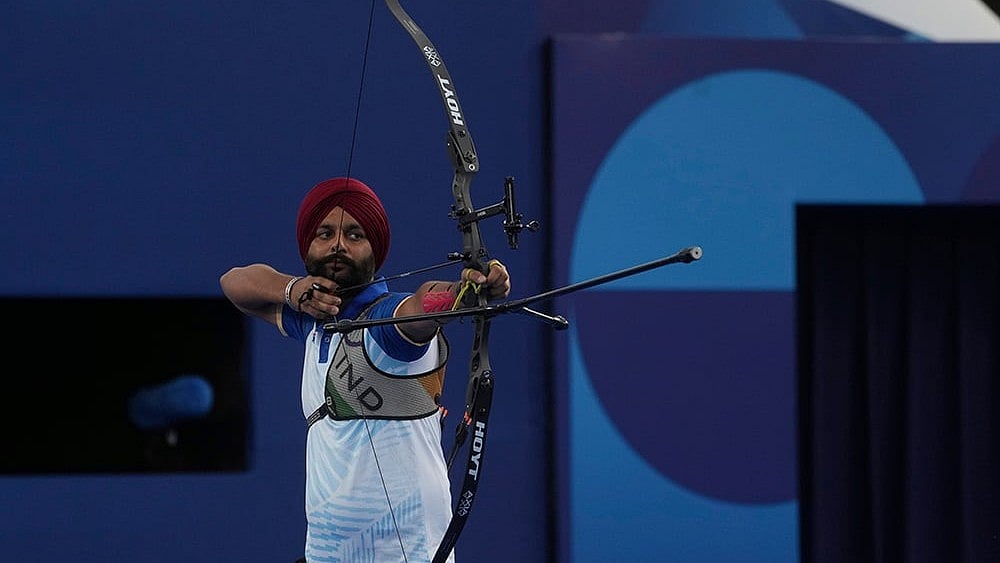 | Photo: AP/Thibault Camus : Harvinder Singh competes in the men's Individual Recurve Open at Paris Paralympics 2024. 
